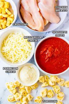 the ingredients to make this pasta dish include chicken, noodles, cheese and tomato sauce