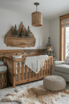 a baby's room with a crib, rocking chair and teddy bear