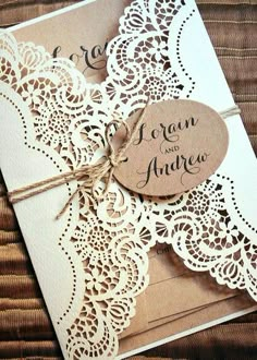 a wedding card with lace on it and a tag that says dream and amrea