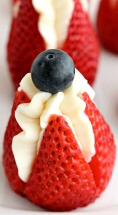 strawberries with white chocolate and blueberries on top