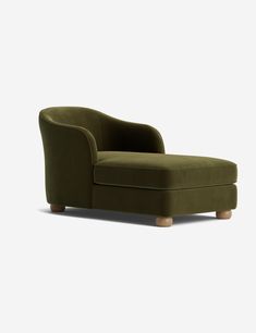 an olive green chaise lounge chair with wooden legs