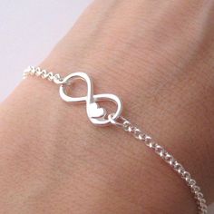 950 Platinum Infinity Knot Heart Charm Friendship Bracelet Fine Jewelry Infinity Knot, Knot Design, Sophisticated Style, Infinity Bracelet, Heart Charm, Timeless Pieces, Make Sure, Friendship Bracelets, Statement Pieces