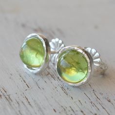 Peridot earrings,peridot studs,gemstone earrings,august birthstone,silver earrings,green earrings Sterling silver stud earrings with 6 mm natural Peridot stone. Dainty and delicate earrings. Perfect for everyday, simple but classic. Amazing look, no one will miss!! *Made from sterling silver or gold filled stud earrings.  *Stone size - 6mm. All my jewelry are packed in an elegant gift box. If you want to give it as a gift you can specify the address and I'll be happy to send it on your behalf. T Lime Green Jewelry With Matching Earrings For Gift, Lime Green Sterling Silver Birthstone Jewelry, Lime Green Birthstone Jewelry Gift, Lime Green Birthstone Jewelry For Gifts, Peridot Gemstone Round Earrings, Handmade Peridot Round Earrings, Peridot Gemstone Earrings, Round Peridot Gemstone Earrings, Handmade Round Peridot Earrings