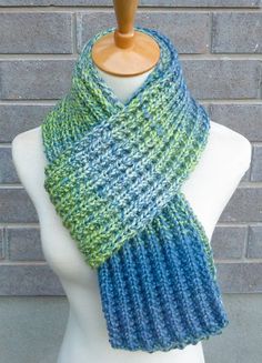 "This beautiful hand knitted scarf is made with high quality and wonderfully soft Merino Wool Blend Yarn (40% Merino Wool, 60% Acrylic). Classic ribbed pattern, it looks the same on both sides. The scarf can be worn in multiple ways. Very beautiful colors: shades of blue and green. The colors may appear slightly different on different monitors. Measures: 65\" (165 cm) long x 7\" (16-17 cm) wide (unstretched). From a smoke-free home. Care instructions: Hand wash in cool water and dry flat." Hand Knitted Scarf, Chunky Knit Scarf, Scarf Chunky, Chunky Knit Scarves, Merino Wool Scarf, Hand Knit Scarf, Green Wool, Scarf Pattern, Wool Scarf