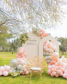 an outdoor area with balloons and chairs