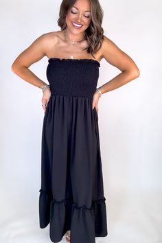 Be ready to shine in our Sunsational Maxi Dress! This flowy, strapless boho beauty will have you feeling effortlessly stylish at any occasion. Show off your shoulders in smocked detail and be the center of attention (in the best way!) Fit: She is wearing her true size medium. Fits true to size. If in between sizes, size down. Strapless Bandeau Dress With Smocked Back For Day Out, Ruched Bandeau Strapless Dress For Day Out, Flowy Maxi Dress For Day Out, Flirty Off-shoulder Strapless Dress For Vacation, Vacation Strapless Dress With Smocked Bodice, Chic Ruched Strapless Dress For Vacation, Vacation Strapless Bandeau Dress With Smocked Bodice, Strapless Summer Tube Top With Smocked Back, Summer Strapless Tube Top With Smocked Back