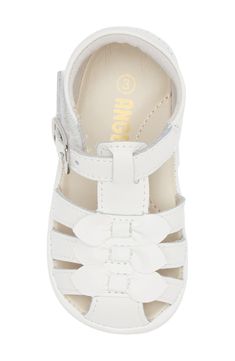 Your little one will love stepping out in this soft leather fisherman sandal topped with a dainty bow and outfitted with an arch-supporting footbed. Adjustable hook-and-loop strap Leather upper and lining/rubber sole Imported White Closed Toe Sandals With Bow, White Sandals With Bow And Round Toe, White Bow Sandals For Spring, White Synthetic Sandals With Soft Sole, White Sandals With Soft Sole For Spring, Bow Sandals, Stepping Out, Soft Leather, Leather Straps