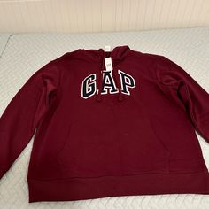 Super Comfortable Maroon Hoodie Brand New With Tags Gap Hooded Hoodie For Fall, Gap Sweatshirt With Adjustable Hood For Fall, Sporty Gap Hoodie For Fall, Gap Fleece Hoodie For Fall, Gap Hooded Tops For Fall, Gap Tops With Drawstring Hood For Fall, Casual Gap Hooded Hoodie, Casual Gap Hoodie For Fall, Casual Hooded Gap Hoodie