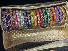 Indian kundan return gifts handmade bangles for girls and teenagers  Sizes 2'4 available  Note : random colors only Note: 10  sets in each wrap Festival Dori Work Bangle Bracelets, Festival Dori Work Bangle Bracelet, Multicolor Bangle Bracelet With Dori Work, Multicolor Bangle Bracelets With Dori Work, Festival Bangle Bracelets With Dori Work, Dori Work Bangle Jewelry Gift, Diwali Bangle Bracelet With Dori Work, Festival Bangle With Dori Work, Multicolor Dori Work Bangle For Diwali