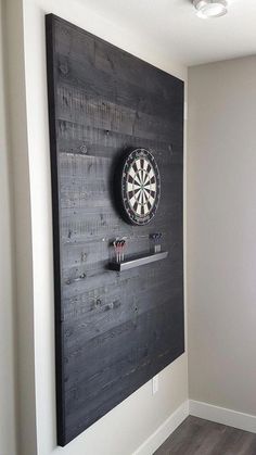 a dart board mounted to the side of a wall