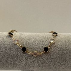 Excellent Condition. Gold Finish Is Gorgeous With Alternating Black And Clear Swarovski Crystals. Bracelet Measures 7 1/4”. Looks Like It Was Never Worn. Really Nice! Check Out Other Items In My Closet! Bundle For The Best Discount! Questions? Leave A Comment Below! Inv Note- J6095 Elegant Round Crystal Rhinestone Bracelet, Elegant Metal Crystal Bracelet With Stones, Elegant Jeweled Metal Crystal Bracelet, Elegant Jeweled Crystal Bracelet, Black Crystal Jewelry With Jeweled Details, Elegant Crystal Bracelet With Stones, Black Jewelry With Sparkling Stones For Party, Black Cubic Zirconia Jewelry With Sparkling Stones, Black Crystal Jeweled Jewelry