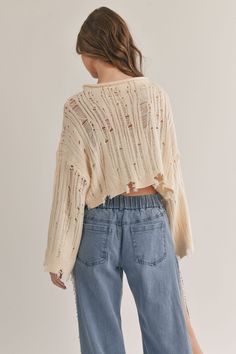 distressed sweater top, cream sweater, knit sweater, cropped sweater, fall sweater, fall fashion, fall outfit inspo, outfit inspo 2023, fall outfit, winter fashion, winter outfits, winter sweater, ootd, ootn, travel outfit, sweater, going out outfit, everyday outfit, date night outfit, online shopping, Christmas outfit, clothing brand, online clothing store, concert fashion, aesthetic fashion, holiday fashion, trendy fashion, pumpkin patch outfit, thanksgiving outfit, sweater weather #fallfashio Casual Cropped Pointelle Knit Sweater, Casual Cropped Sweater In Pointelle Knit, Distressed Long Sleeve Sweater For Spring, Casual Ripped Sweater For Fall, Casual Spring Sweater With Frayed Hem, Casual Sweater With Frayed Hem For Spring, Hole Sweater Outfit, Thanksgiving Outfit Sweater, Outfit Inspo 2023