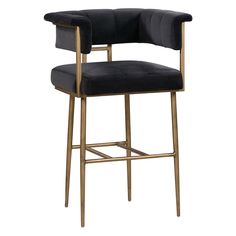 an upholstered black velvet bar stool with gold frame and backrest, on a white background