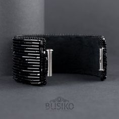 Wide black cuff bracelet with silver bead strips for lovers of statement exclusive jewelry. This jewelry is created for those who prefer chic in modern style. If you are brave and are not afraid of experimenting with your style, then this is a elegant accessory for you. These beautiful bracelet you can wear with elegant dresses or with clothes of different style. He just as perfectly meet to outfit for a evening celebration. This bracelet are totally handmade by the author's sketches and embroid Luxury Handmade Beaded Bangle Bracelets, Luxury Handmade Beaded Bangle Bracelet, Handmade Adjustable Beaded Bracelets For Formal Occasions, Elegant Beaded Bracelets With Round Beads, Handmade Wearable Art Cuff Bracelet For Party, Handmade Formal Beaded Bracelets, Elegant Beaded Cuff Bracelet As Gift, Elegant Beaded Cuff Bracelet For Gift, Elegant Beaded Cuff Jewelry