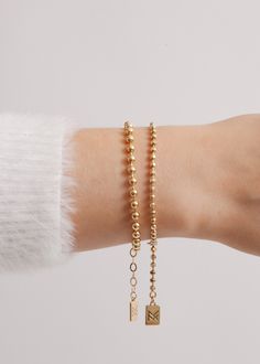 Like the popular lifestyle blogger Amy Jackson for which it was named, the Fashion Jackson bracelet emits an air of classy sophistication. Featuring an endless chain of luminous rounded gold beads, this piece has become everyone's must-have bracelet. Dress it up or down—the options are endless. STYLING TIP: Get Amy's look! Pair it with our best selling London Bracelet. 18k gold-plated sterling silver or sterling silver Adjustable from 6.5" to 8.25" and the beads are 4mm 14k Gold Filled Beaded Chain Bracelets As Gift, Adjustable Gold Beaded Rosary Bracelet, Adjustable Gold Beaded Chain Rosary Bracelet, Gold Beaded Chain Bracelet In 14k Gold Filled, Elegant Everyday Ball Chain Bracelets, Elegant Ball Chain Bracelet, Gold Beaded Chain Rosary Bracelet With Round Beads, Gold Rosary Bracelet With Beaded Chain, Gold Beaded Chain Bracelet For Everyday