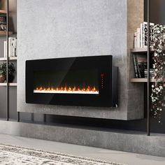 a modern fireplace in the middle of a living room