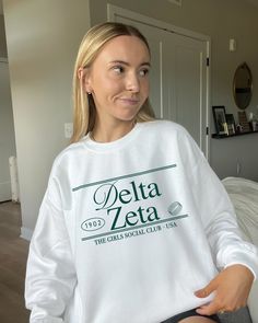 the dee zee (social club ♡ Super soft sweatshirt comes in unisex sizing! Reference the size chart for additional details. It is recommended to SIZE UP for an oversized fit   ♡ Sweatshirt comes in white with a forest green print. Please check listing photos for color reference! ♡ Please make sure you are ordering for the correct sorority before placing an order! This listing is for DELTA ZETA. We are unable to accept returns or exchanges for this since all items are made to order.   ♡ INSTRUCTIONS FOR CARE:  1. Turn inside out before washing  2. Wash on a gentle cycle  3. Recommended not heat dry to prevent any minimal shrinking, hang to dry instead ♡ It is important that you LOVE your product! If you have any questions or concerns upon receiving your product, please contact me immediately Delta Zeta Apparel, Delta Zeta Shirts, Aesthetic Greek, Big Little Basket, Interest Board, Tri Sigma, Color Reference, Shirt Aesthetic, Delta Zeta