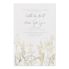 a wedding card with gold foil flowers on it