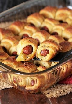 a casserole dish filled with pigs in a blanket