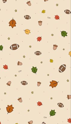 an autumn themed wallpaper with leaves and footballs on it's beige background