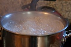 boiling water in a pot on the stove