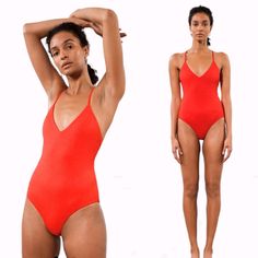 Mara Hoffman | Emma One Piece Red Bathing Suit Swimsuit Size Xs Cross-Over Back Swimwear Editor's Note Mara Hoffman's 'Emma' Swimsuit Is Made From Repreve Polyester - A Sustainable Textile Made From Recycled Plastic Bottles. It Has A Full-Coverage Silhouette With Adjustable Cross-Over Straps Along The Low-Cut Back. Style Yours Like A Bodysuit While En Route To The Beach. Fabric Is Texture And Does Stretch, Medium Weight. Such A Gorgeous & Sexy! Bathing-Suit! A Must Have In Your Wardrobe! Wear Mo Red Fitted V-neck Bodysuit, Fitted Red V-neck Bodysuit, Elegant Red Backless Swimwear, Red Elegant V-neck Swimwear, Elegant Fitted Red Swimwear, Elegant Red Beach Bodysuit, Elegant Red Bodysuit For Beach, Elegant Red Bodysuit For The Beach, Red Bathing Suit