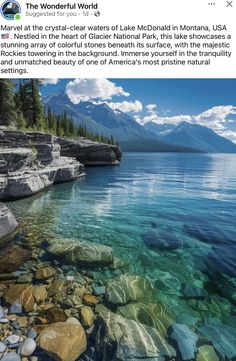 the water is crystal clear and blue with rocks in it's bottom right side