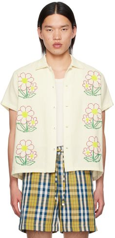 Hand-woven cotton shirt. Floral pattern cross-stitched throughout. · Spread collar · Button closure Supplier color: Off white