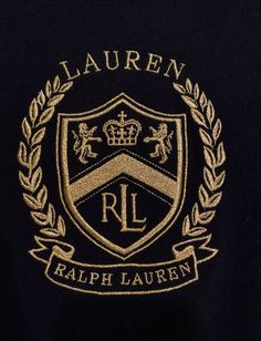 the lauren logo is shown in gold on a black shirt with a laurel around it