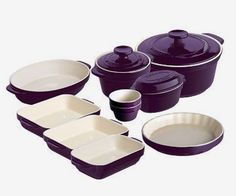 purple and white dinnerware set on a white background, including casserole dishes