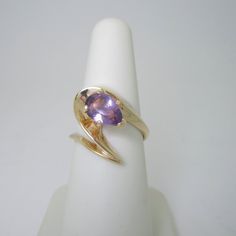 A Beautiful Turn Of Shapes And Colors 14k Solid Gold 1.60 Ct Natural Amethyst Abstract Ring Setting Measures Approx. 19.0 Mm Wide 3.3 Grams Size 7 February Birthstone This Is Nothing Short Of Sensational R205 More Pictures And Info On Goldngals.Com 14k Gold Amethyst Solitaire Ring, Oval Purple Sapphire Ring In 14k Gold, Oval Solitaire Amethyst Ring In 14k Gold, Lavender 14k Gold Jewelry For Formal Occasions, 14k Gold Lavender Amethyst Ring, Yellow Gold 14k Stamped Amethyst Ring, Solitaire Amethyst Ring In Yellow Gold, Oval Shape, Oval Solitaire Amethyst Ring In Yellow Gold, Purple Oval 14k Gold Gemstone