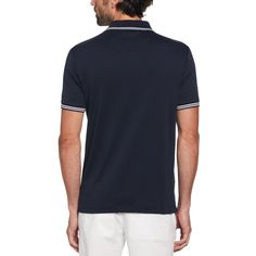 Get the perfect combination of style and comfort with this Original Penguin polo shirt. This slim fit, short-sleeved polo is crafted from 100% organic cotton to provide breathable comfort that's just right for all-day wear. Interlock fabrication ensures a natural stretch for a comfortable and flattering fit. As a versatile wardrobe staple, this men's polo is perfect for casual outings and can also be dressed up for special occasions, work events and more. Fashionable and functional, this polo sh Functional 4-way Stretch Sports Polo Shirt, Penguin Polo Shirt Men, Navy Collared Moisture-wicking Polo Shirt, Blue Short Sleeve Polo Shirt With 4-way Stretch, Moisture-wicking Polo Collar Golf T-shirt, Original Penguin, Polo Blue, Wardrobe Staples, Polo Shirt