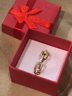 *GIFT BOX INCLUDED!* This beautiful 18K gold chain link cubic zirconia ring is adjustable with an 18K gold plating covering a high quality copper. This adjustable 18K Gold Chain Link Cubic Zirconia Ring is 6mm in width and 4mm in thickness. We ship this ring the same business day to ensure a fast delivery. Thank you for choosing Humble Legends! :) Elegant Diamond Cut Chain Ring As Gift, Elegant Cubic Zirconia Chain Ring Gift, Diamond Chain Ring With Diamond Cut For Gift, Diamond Chain Ring Gift, Diamond Chain Ring With Adjustable Chain As Gift, Gold Cubic Zirconia Chain Ring, Gold Cubic Zirconia Chain Ring For Anniversary, Gold Cubic Zirconia Promise Chain Ring, Gold Cubic Zirconia Chain Promise Ring