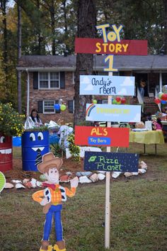 a toy story sign in front of a house