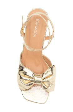 An oversized bow creates visual intrigue on an ankle-strap pump balanced by an open toe and wrapped block heel. 3" heel Adjustable ankle strap with buckle closure Synthetic upper and lining/rubber sole Imported Guy Shoes, Ribbon Heels, Ribbon Shoes, Ankle Strap Pumps, Gold Ribbon, Gold Ribbons, Heel Sandal, Block Heels Sandal, Nordstrom Rack