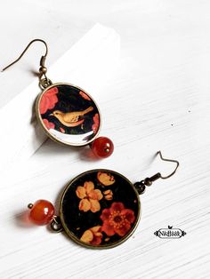 "These perfect earrings are handmade with love to give you a stylish look and make you feel special. The round bezel is in antique bronze tone made of Copper (Cadmium Free). They measure about 1 inch in diameter. The ear wire is made of Alloy measuring 3/4\" and hang down from ear approximately 2 1/4 inches. They are ready to ship and will come packaged ready for giving. While each piece is packed individually in a kraft or plastic paper bag, your jewelry will look its best in a box! You can add Handmade Vintage Circle Earrings, Round Metal Cabochon Earrings, Vintage Circle Earrings For Gift, Antique Finish Brass Round Earrings, Round Metal Earrings With Antique Finish, Antique Finish Round Metal Earrings, Persian Motifs, Reno Nv, Persian Pattern