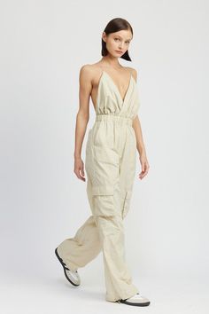 Introducing the perfect addition to your casual wardrobe: our Nixon Cargo Jumpsuit! With its V-neckline, elastic waist and loose, cargo pants, this jumpsuit is sure to become your new go-to. Model is 5’9” wearing a size small. Fabric Contents: 100% Nylon Cargo Jumpsuit, Maxi Romper, Dusty Mauve, Athleisure Tops, Utility Style, Sweater Hat, Cardigan Sweater Coat, Sweater Collection, Vegan Fashion