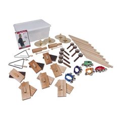 a wooden toy train set with accessories and instructions