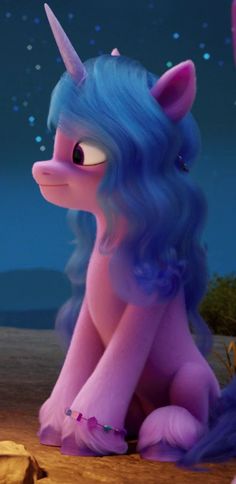 a pink and blue pony sitting on top of a wooden floor next to a tree