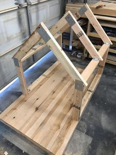 a wooden structure being built in a garage