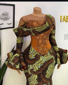 This has a very little but unique detailing that makes the dress ravishing. Ankara Corset Dress, Ankara Corset, African Bridal Dress, Latest Ankara, Kente Styles, Ankara Fashion, Latest Ankara Styles, Ankara Skirt, African Ankara