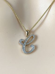 This is a beautiful initial letter diamond design pendant/ necklace. It is set in real solid 10K Gold.  This is a perfect special gift for mom, wife, fiancée, girlfriend, valentine, daughter, family or friends.  Made in Montréal Canada 🇨🇦. All Letters are available! Sold as pendant Only or with Chain. 💎Pendant Detail Metal Purity: 10K solid Gold Color: Yellow Gold Stamp: 10K Italy  Size: 15mm Stone: Natural Diamond  Quantity: 15 pcs small diamonds Weight: 1.3g Approximately  Condition: New ⛓ Luxury Yellow Gold Diamond Initial Pendant Necklace, White Diamond Initial Pendant Necklace For Anniversary, 14k Gold Diamond Initials Necklace For Anniversary, 14k Gold Diamond Necklace With Initials For Anniversary, 14k Gold Diamond Necklace For Anniversary With Initials, 14k Stamped Initial Pendant For Anniversary, 14k Stamped Initial Pendant Necklace For Anniversary, Elegant 14k Stamped Initial Necklace For Anniversary, Yellow Gold Diamond Necklace With Initials For Anniversary