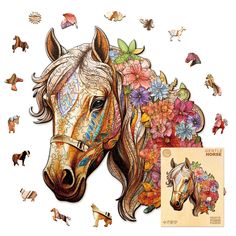 a horse with flowers on it's head is surrounded by other horses and birds