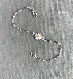 Daisy Bracelet Sterling Silver Satellite Chain Flower Delicate Sterling Silver Flower Bracelets, Delicate Sterling Silver Flower Bracelet, Delicate Flower-shaped Sterling Silver Bracelets, Dainty White Gold Flower Bracelet, Silver Daisy Jewelry Gift, Adjustable Daisy Everyday Jewelry, Dainty Daisy Sterling Silver Jewelry, Silver Daisy Jewelry For Gift, Dainty Silver Flower Charm Bracelet