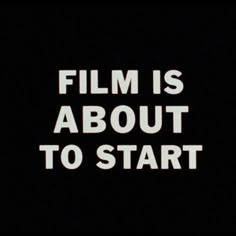 the words film is about to start written in white on a black background that appears to be dark