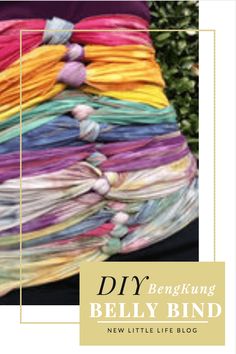 a woman is holding a large bundle of yarn in her hands with the words diy belly bind on it