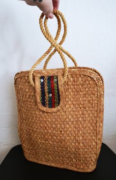 Woven Straw purse,boho bag,top handle bag Really cute tan, brown straw purse with colorful stripe design Purse has 2 outside pockets PLEASE SEE MEASUREMENTS Measures: 13'' x 12 1/2'' x 4'' Straps: 20'' with an 8'' drop Good condition- b196 Woven Straw purse,boho bag,top handle bag Bohemian Brown Beach Bag With Handles, Rectangular Straw Shoulder Bag For Market, Bohemian Brown Straw Bag With Handles, Beige Basket Shoulder Bag With Top Carry Handle, Bohemian Multicolor Straw Shoulder Bag, Bohemian Straw Satchel Bag With Handles, Bohemian Shoulder Bag With Bamboo Handle For Shopping, Bohemian Satchel Straw Bag With Handles, Bohemian Straw Satchel With Handles