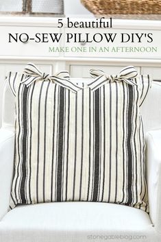 a black and white striped pillow with the words pretty no sew ribbon pillow diy