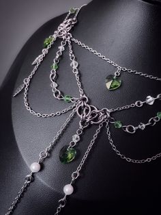 *.~ A delicate looking, multi chain necklace adorned with gorgeous green hearts and steel leaves. Perfect look for any fantasy outfit for even day to day! ~.* *.~ Handmade stainless steel necklace with green crystal glass hearts, faux pearls and glass beads *.~ 15" necklace with a 1.75" extension *.~ Please check measurements first before buying *.~ Colours may differ on screen and in life *.~ Shipping will be sent tracked and signed internationally, and 1st class signed UK. 15 Necklace, Green Hearts, Glass Hearts, Multi Chain Necklace, Craft Booth, Green Crystal, Gothic Outfits, Beauty And Fashion, Glass Heart