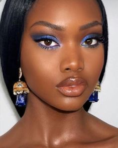 Makeup With Blue Waterline, Blue Shimmer Eye Makeup, Blue Eyeshadow Red Lipstick, Blue Eyeshadow On Brown Skin, Makeup For Navy Blue Dress Wedding, Colored Undereye Makeup, Blue Eye Shadow Looks For Brown Eyes, Blue Eyeshadow Looks Black Women, Blue Eyeshadow Black Women